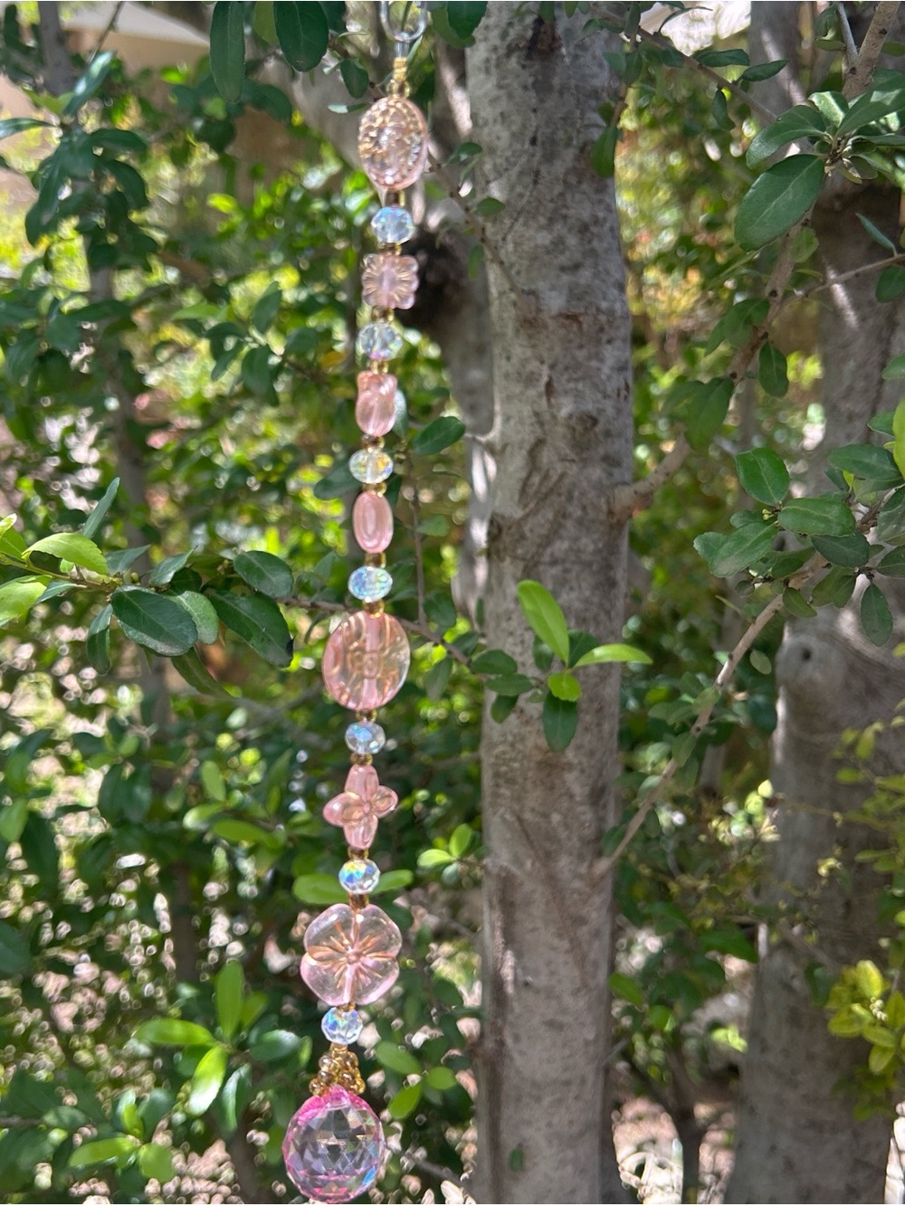 Handmade pink floral beaded strand suncatcher